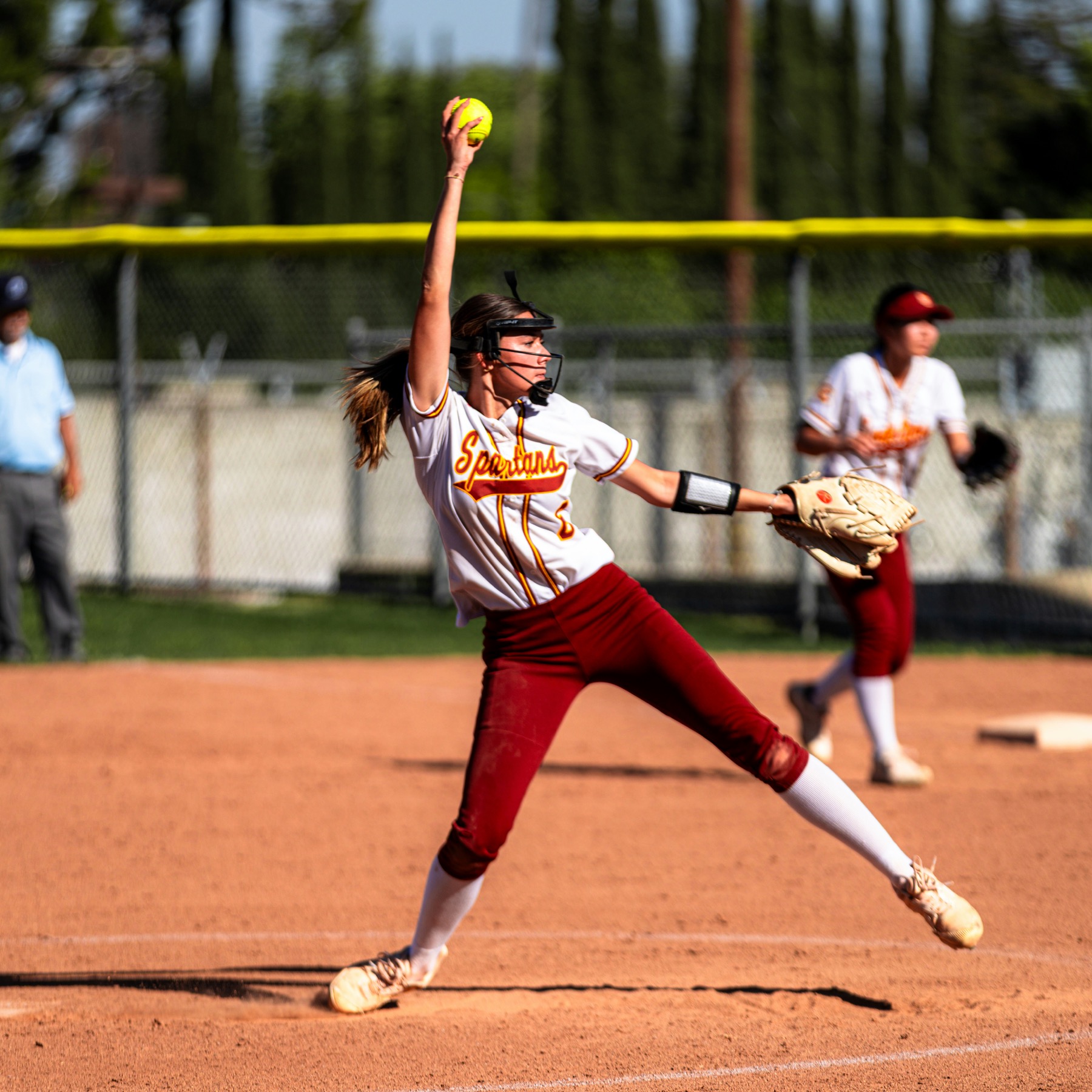Softball pitcher throwing from the circle
